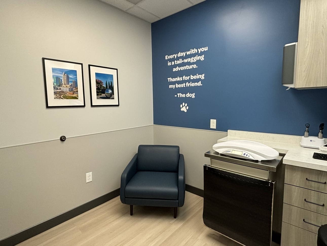 The corner of an exam room with the exam table folded in