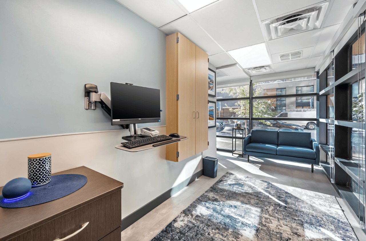 Empty exam room with glass windows